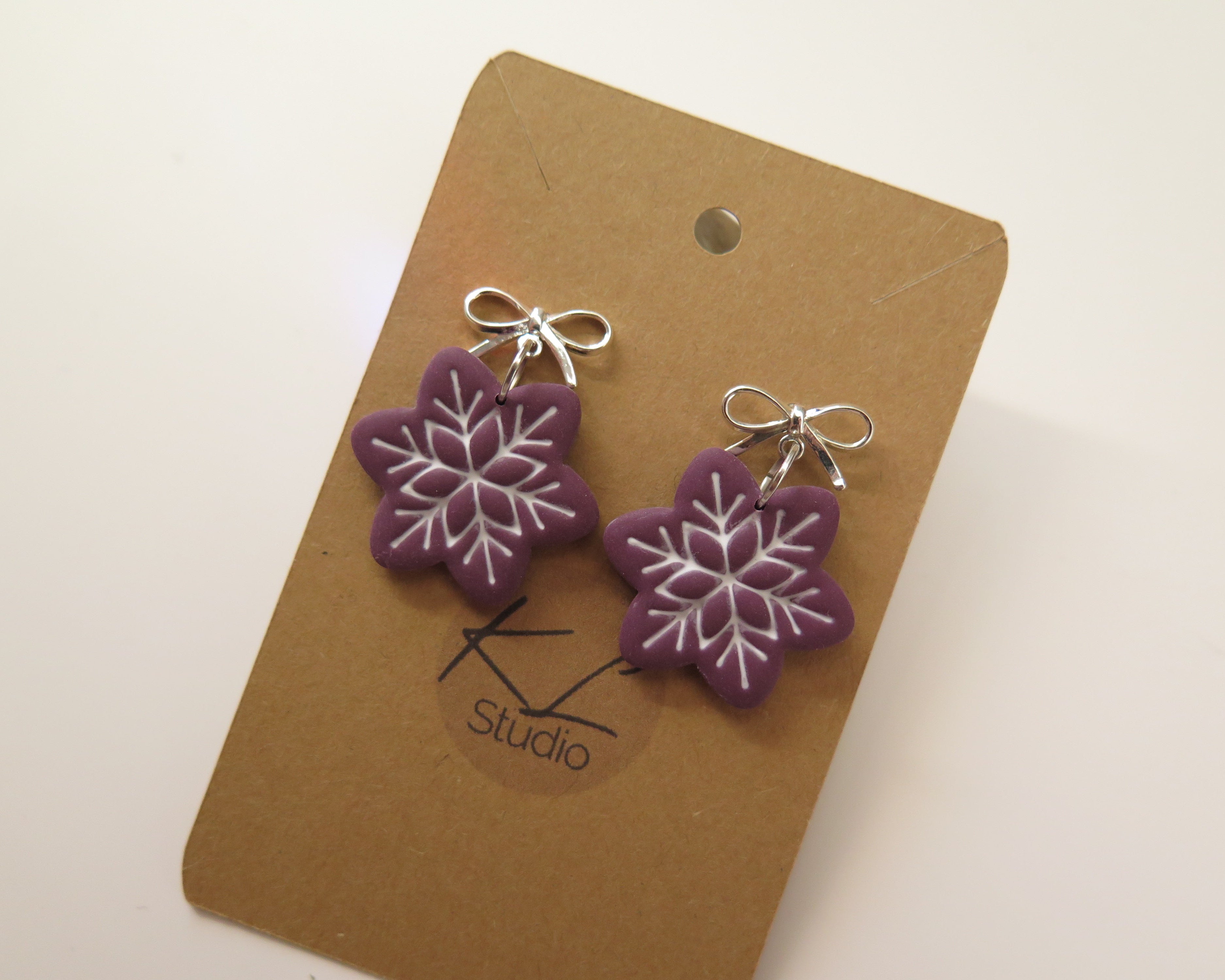 Schleife mit Schneeflocke